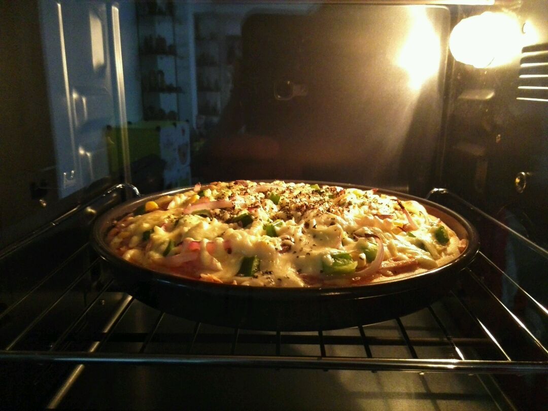 放入烤箱再烤钟