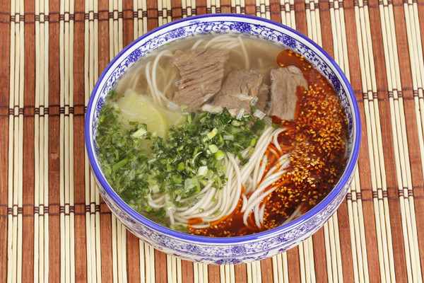 ţ