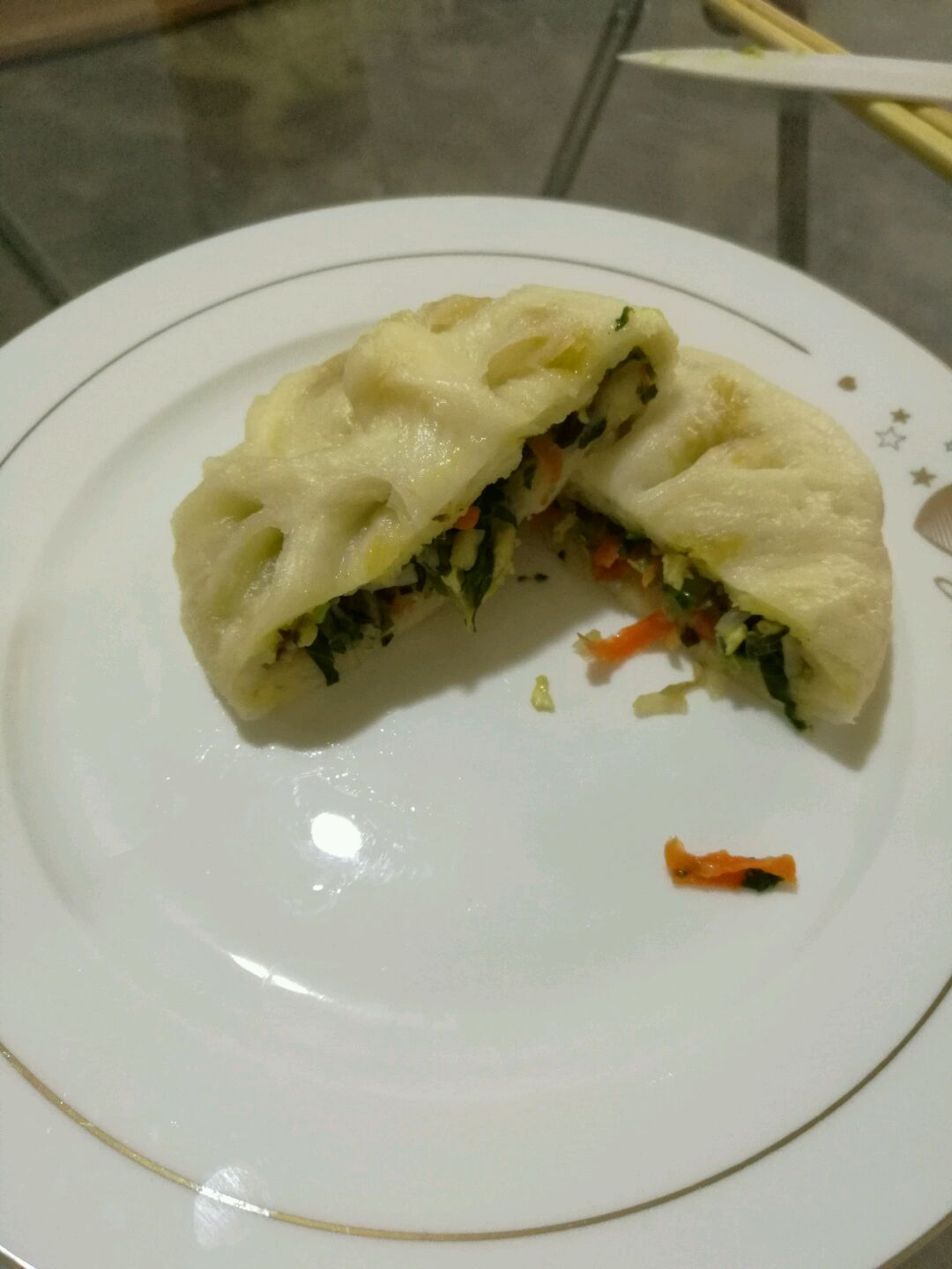 ڰ